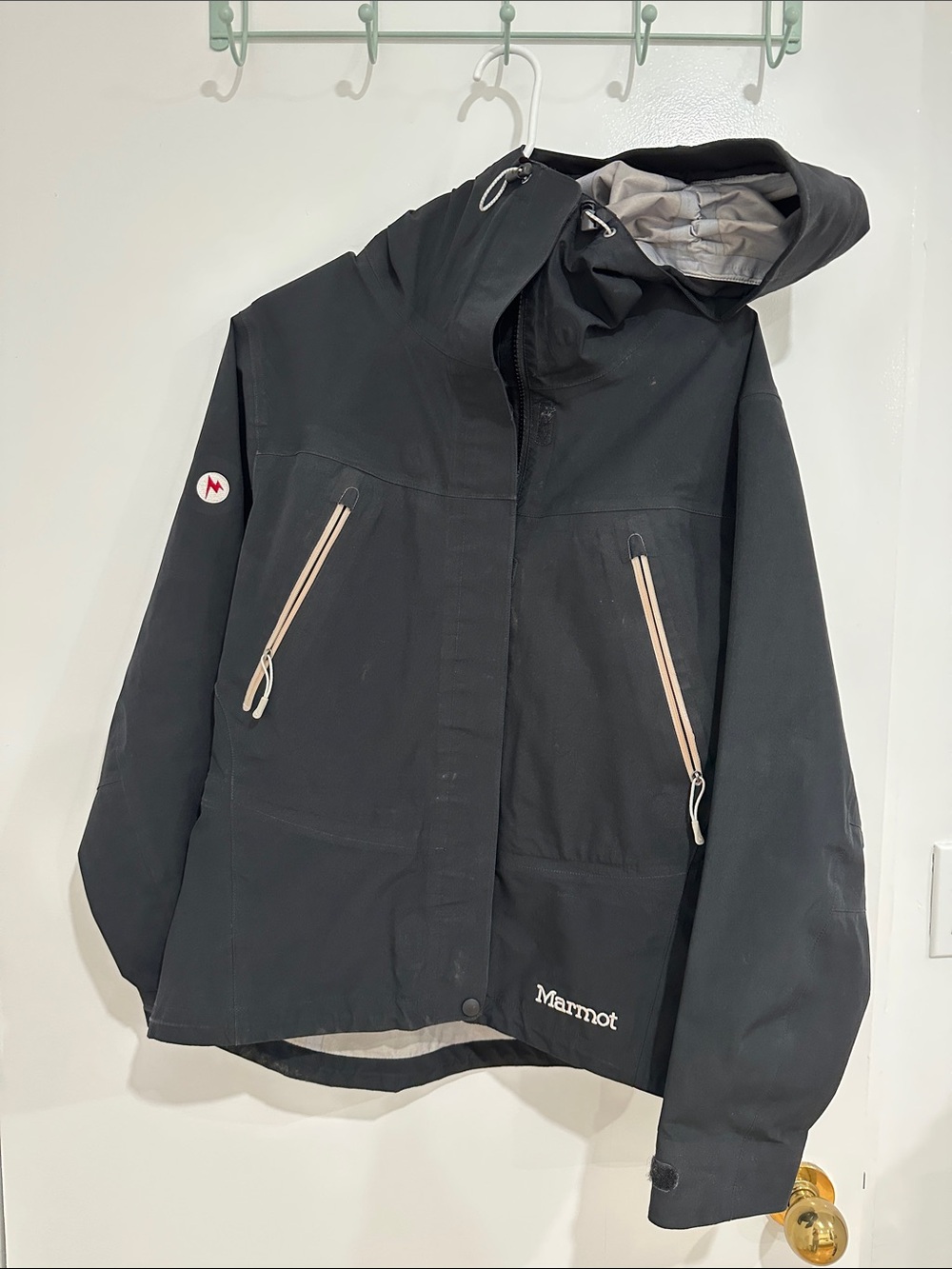 Marmot Black Ski Jacket with Tan Zipper Accents